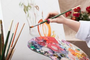depositphotos_42723837-stock-photo-artist-painting-a-picture-585430296
